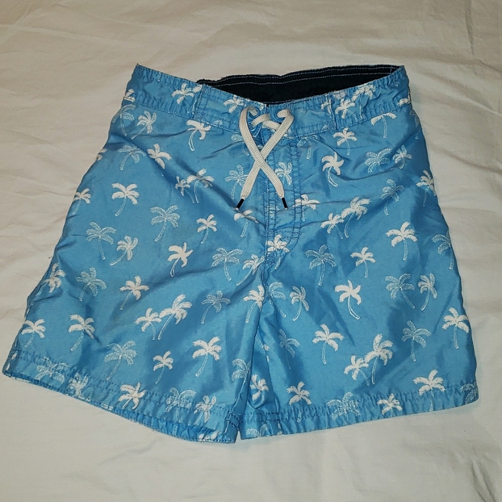 H&M 10-12Y bright blue with white palm trees lined Board Shorts